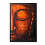 Framed wall art featuring a close-up textured painting of a Buddha face in warm orange, red, and brown tones, set in a black frame against a white background.